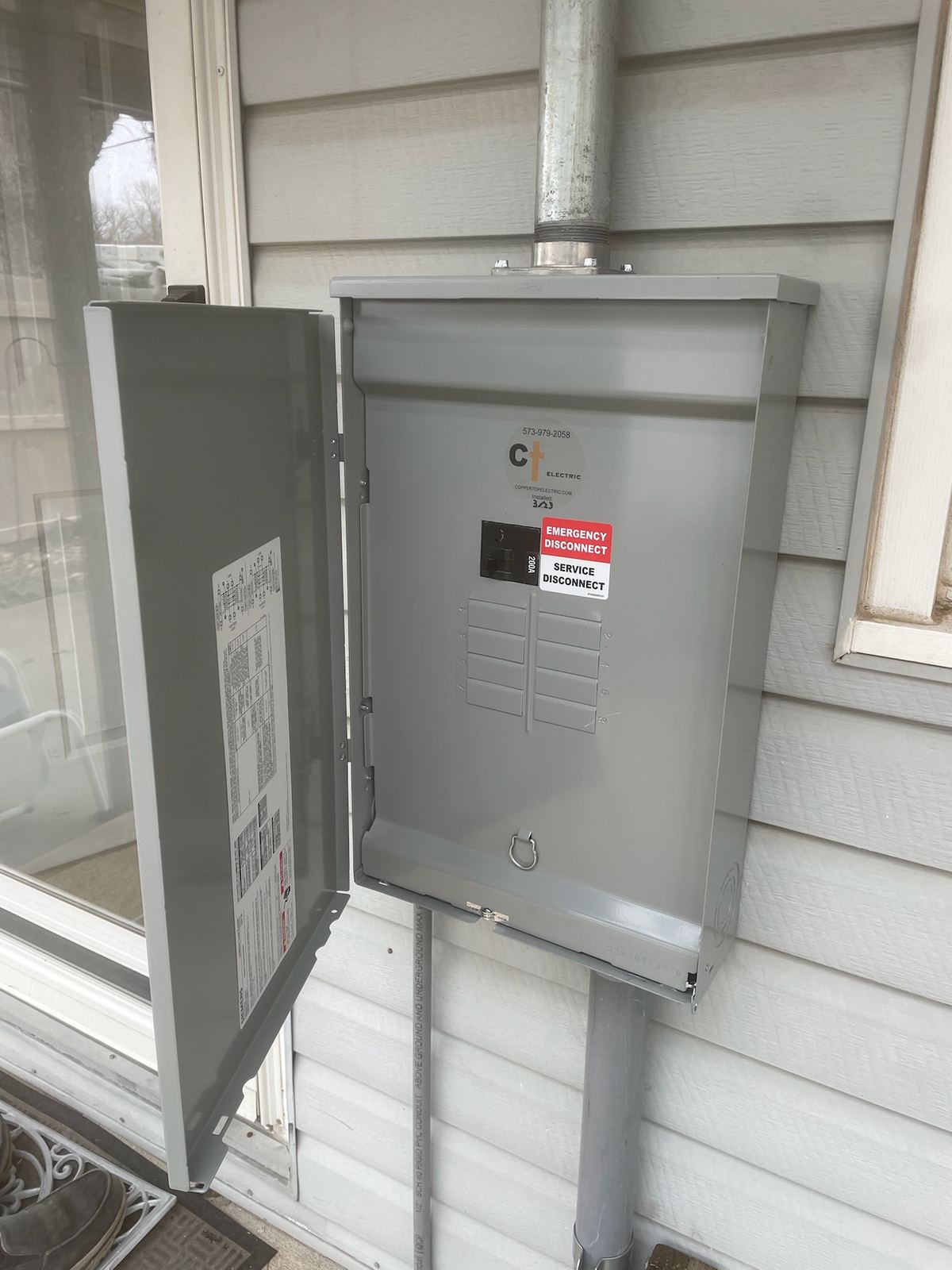 Generator interlock kit installed in a panel